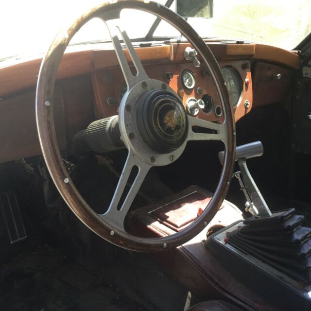 1957 Gray Jaguar XK Coupe