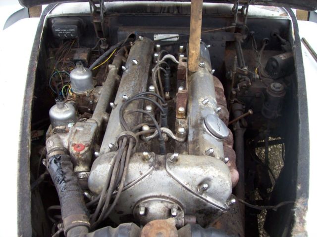 1957 White Jaguar XK COUPE