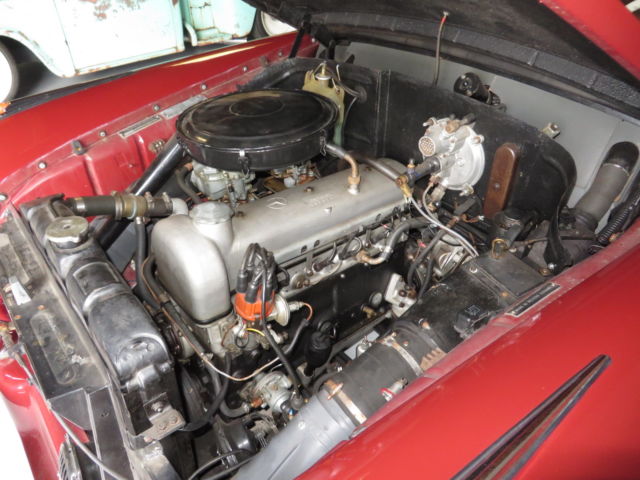 1957 Red Mercedes-Benz 200-Series Sedan