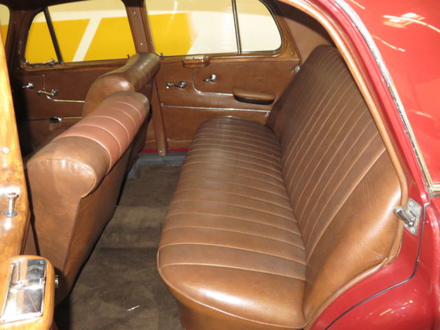 1957 Red Mercedes-Benz 200-Series Sedan