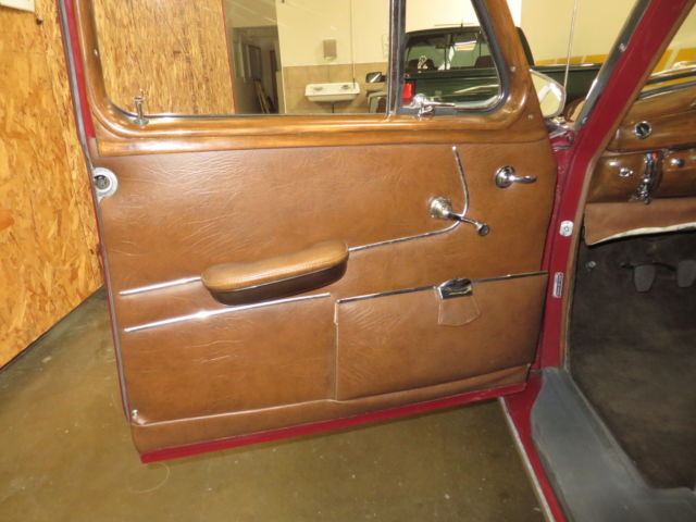 1957 Red Mercedes-Benz 200-Series Sedan