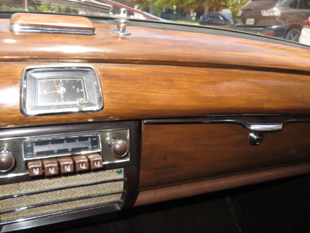 1957 Red Mercedes-Benz 200-Series Sedan