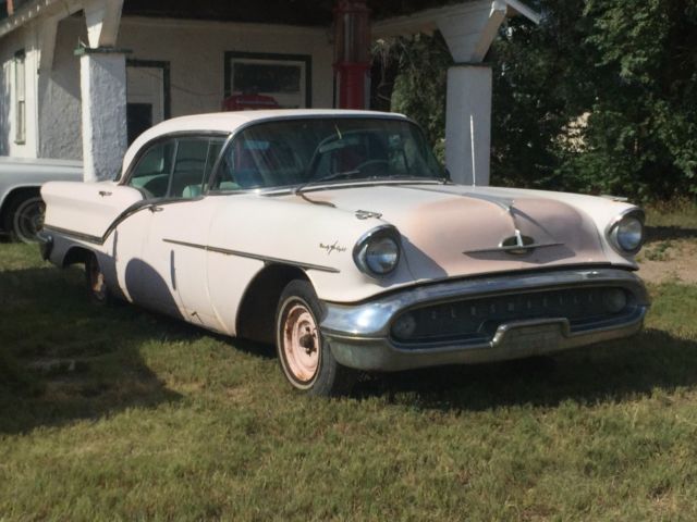 1957 Pink Oldsmobile Ninety-Eight Sedan