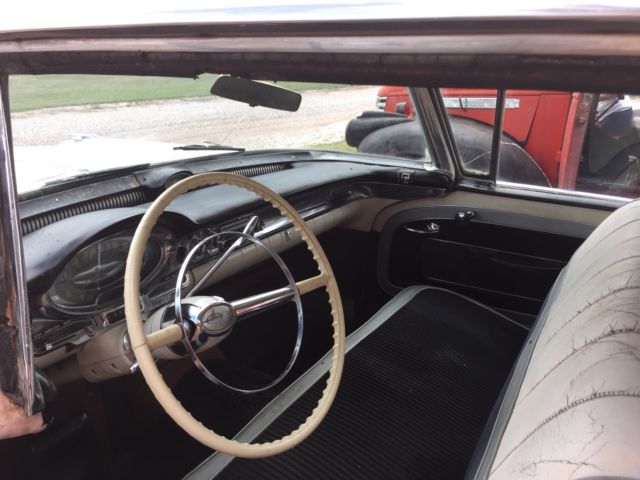 1957 Pink Oldsmobile Ninety-Eight Sedan