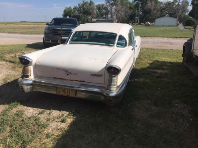 1957 Pink Oldsmobile Ninety-Eight Sedan
