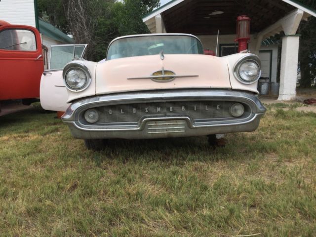 1957 Pink Oldsmobile Ninety-Eight Sedan
