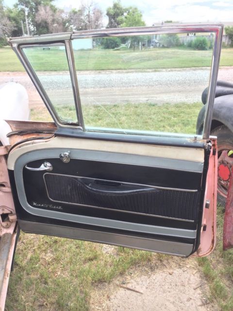 1957 Pink Oldsmobile Ninety-Eight Sedan