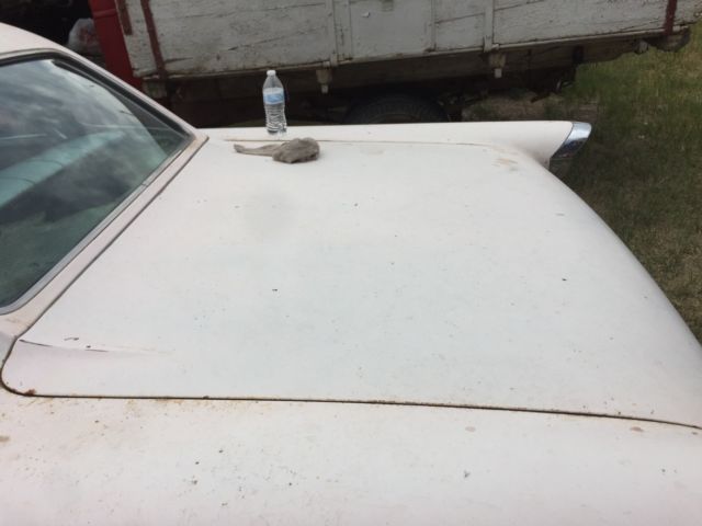 1957 Pink Oldsmobile Ninety-Eight Sedan