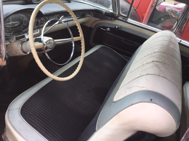 1957 Pink Oldsmobile Ninety-Eight Sedan