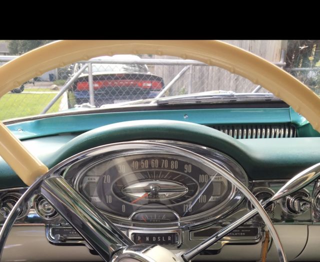 1957 green oldsmobile G80 Coupe