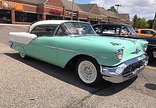 1957 green oldsmobile G80 Coupe