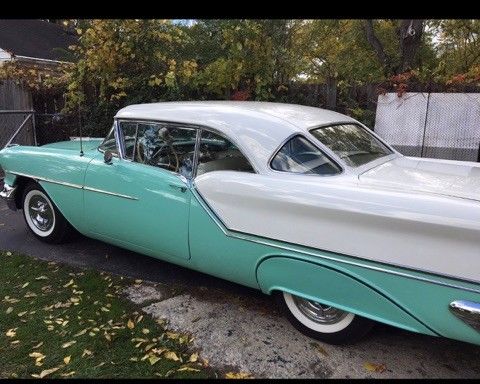 1957 green oldsmobile G80 Coupe