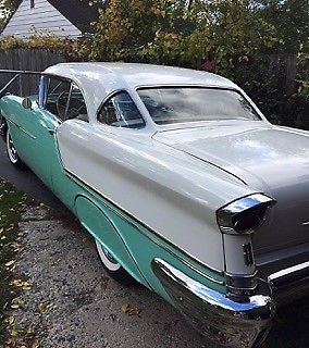 1957 green oldsmobile G80 Coupe