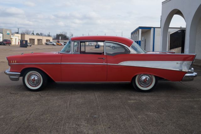1957 Orange Chevrolet Bel Air Coupe