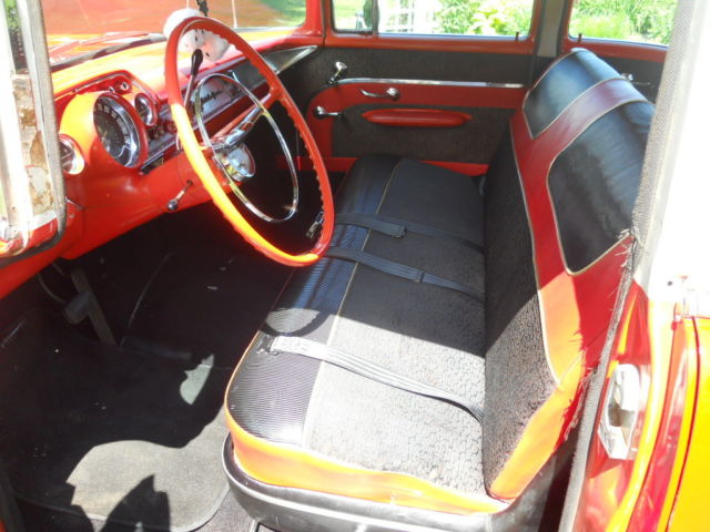 1957 Red Chevrolet Bel Air/150/210 Sedan