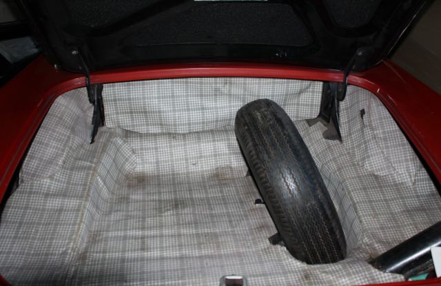 1957 Red Ford Thunderbird Convertible hard top