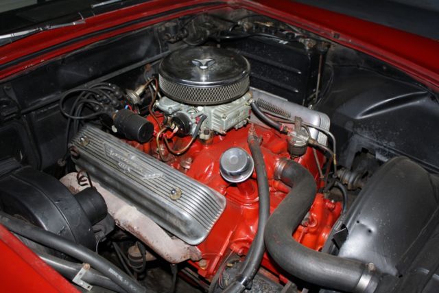 1957 Red Ford Thunderbird Convertible hard top