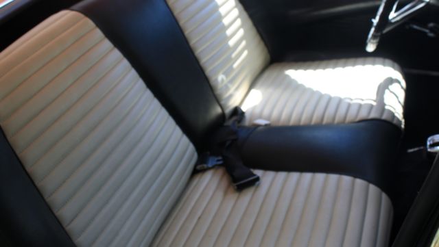 1957 Red Ford Thunderbird Convertible hard top