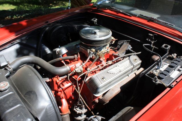 1957 Red Ford Thunderbird Convertible hard top
