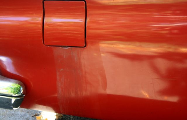 1957 Red Ford Thunderbird Convertible hard top