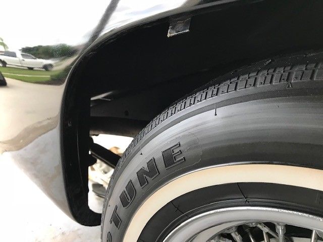 1957 Black Ford Thunderbird 2 door covertable