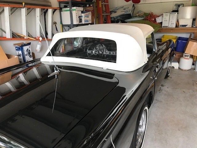 1957 Black Ford Thunderbird 2 door covertable