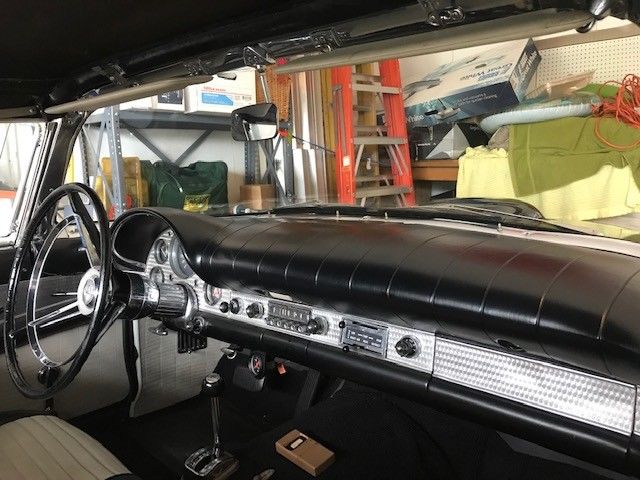 1957 Black Ford Thunderbird 2 door covertable