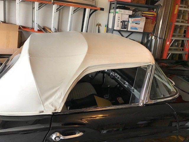 1957 Black Ford Thunderbird 2 door covertable