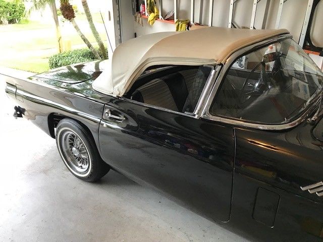 1957 Black Ford Thunderbird 2 door covertable