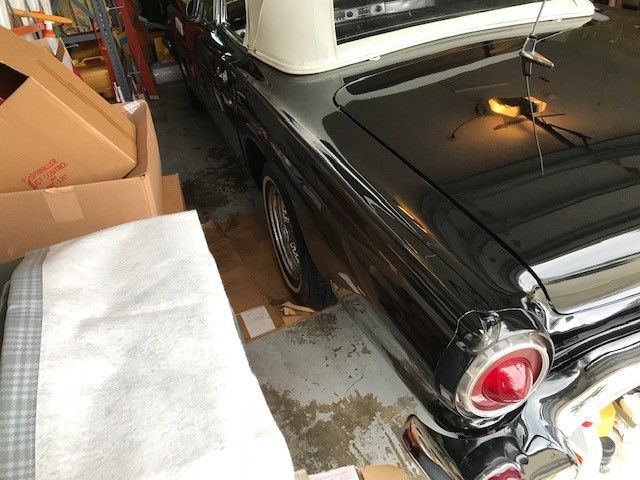 1957 Black Ford Thunderbird 2 door covertable