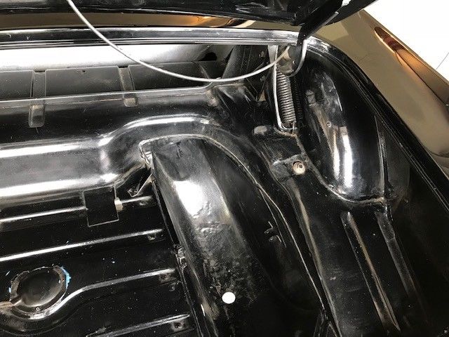 1957 Black Ford Thunderbird 2 door covertable