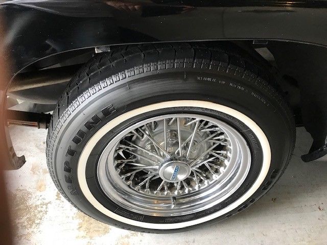 1957 Black Ford Thunderbird 2 door covertable