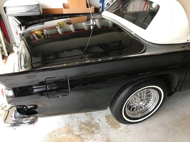 1957 Black Ford Thunderbird 2 door covertable