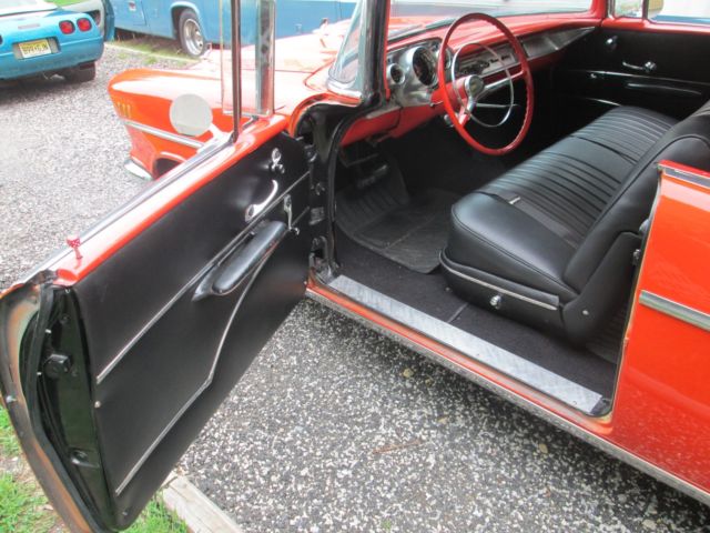 1957 Orange Chevrolet Bel Air/150/210 hardtop