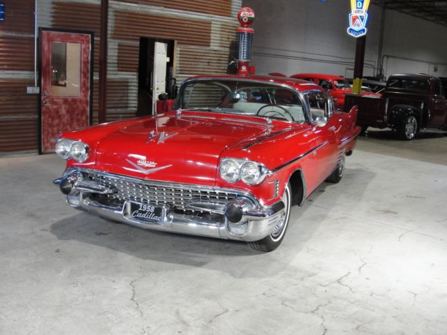 1958 Red Cadillac 62 sport coupe --