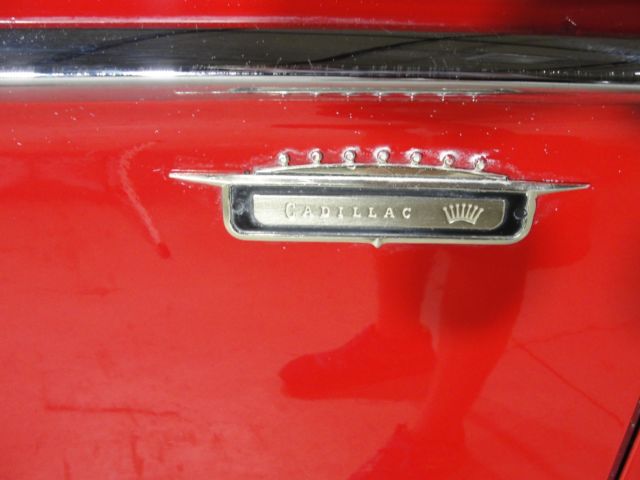 1958 Red Cadillac 62 sport coupe --