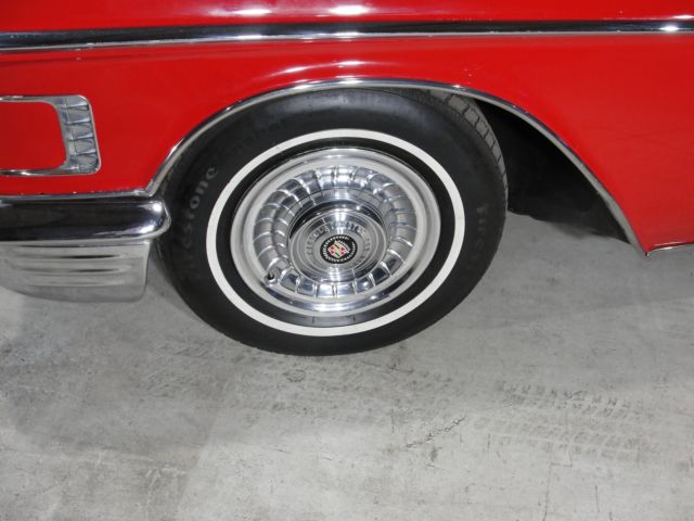 1958 Red Cadillac 62 sport coupe --
