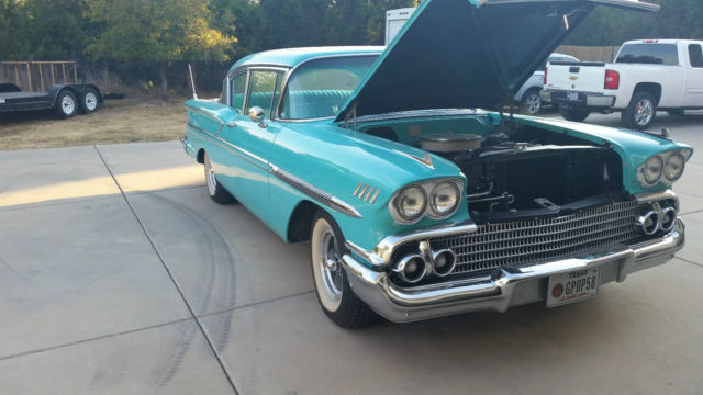 1958 Turquoise Chevrolet Bel Air/150/210