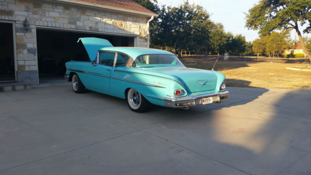 1958 Turquoise Chevrolet Bel Air/150/210