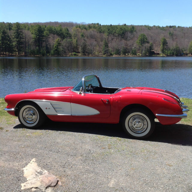 1958 red and white Chevrolet Corvette convertible