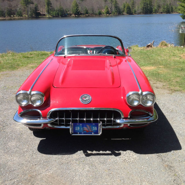 1958 red and white Chevrolet Corvette convertible