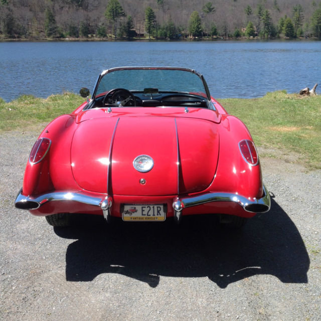1958 red and white Chevrolet Corvette convertible