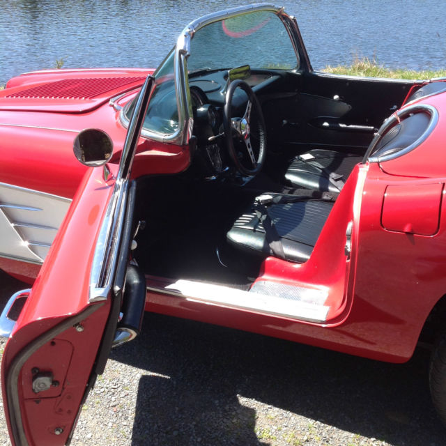 1958 red and white Chevrolet Corvette convertible