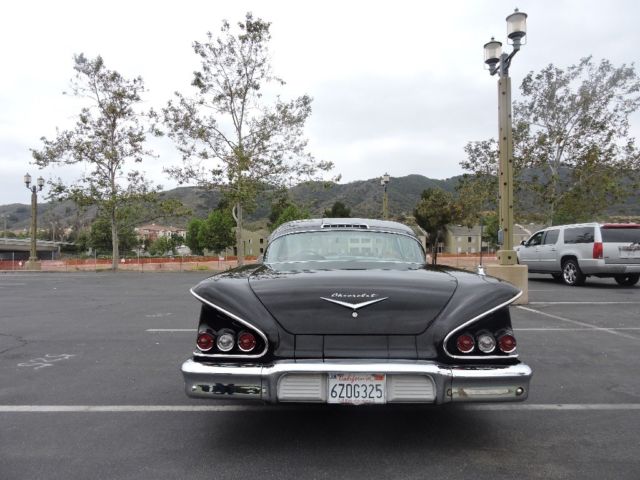 1958 Black Chevrolet Impala Coupe