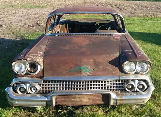 1958 Green Chevrolet Impala Coupe