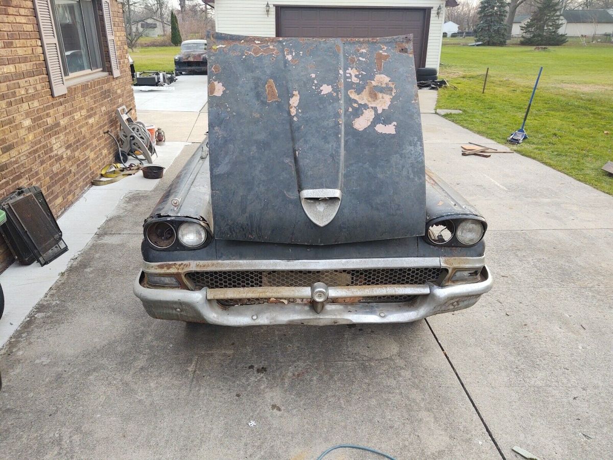 1958 Black Ford Skyliner Convertible