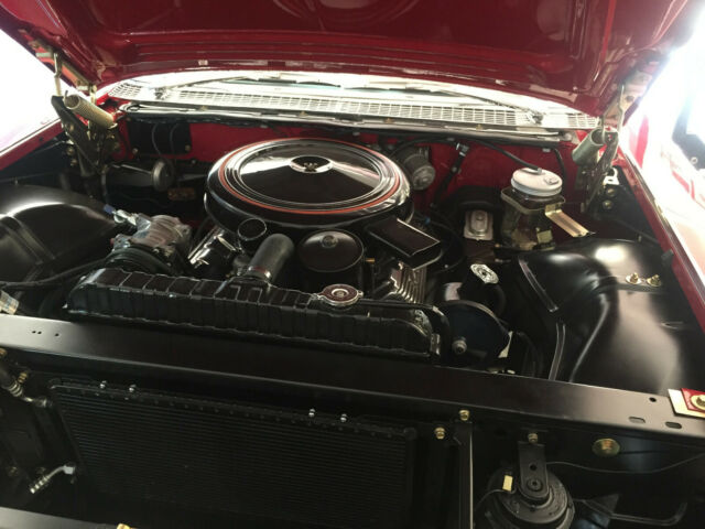 1959 Red Cadillac Series 62 Coupe