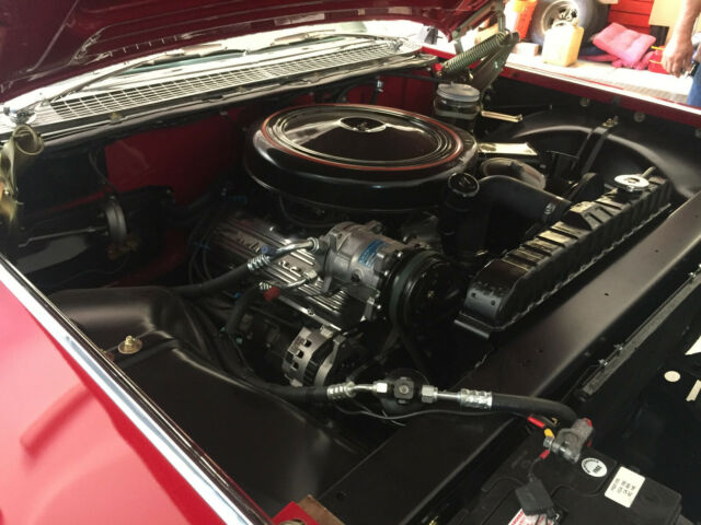 1959 Red Cadillac Series 62 Coupe