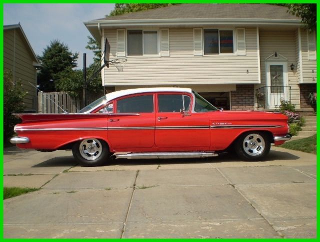 1959 Red Chevrolet Bel Air/150/210 Sedan