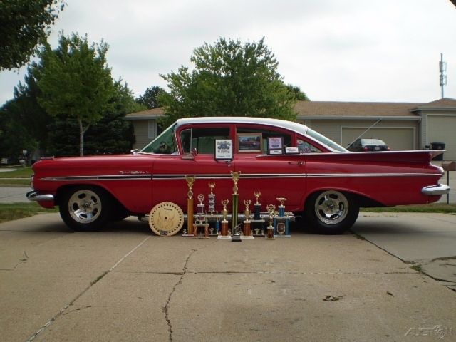 1959 Red Chevrolet Bel Air/150/210 Sedan